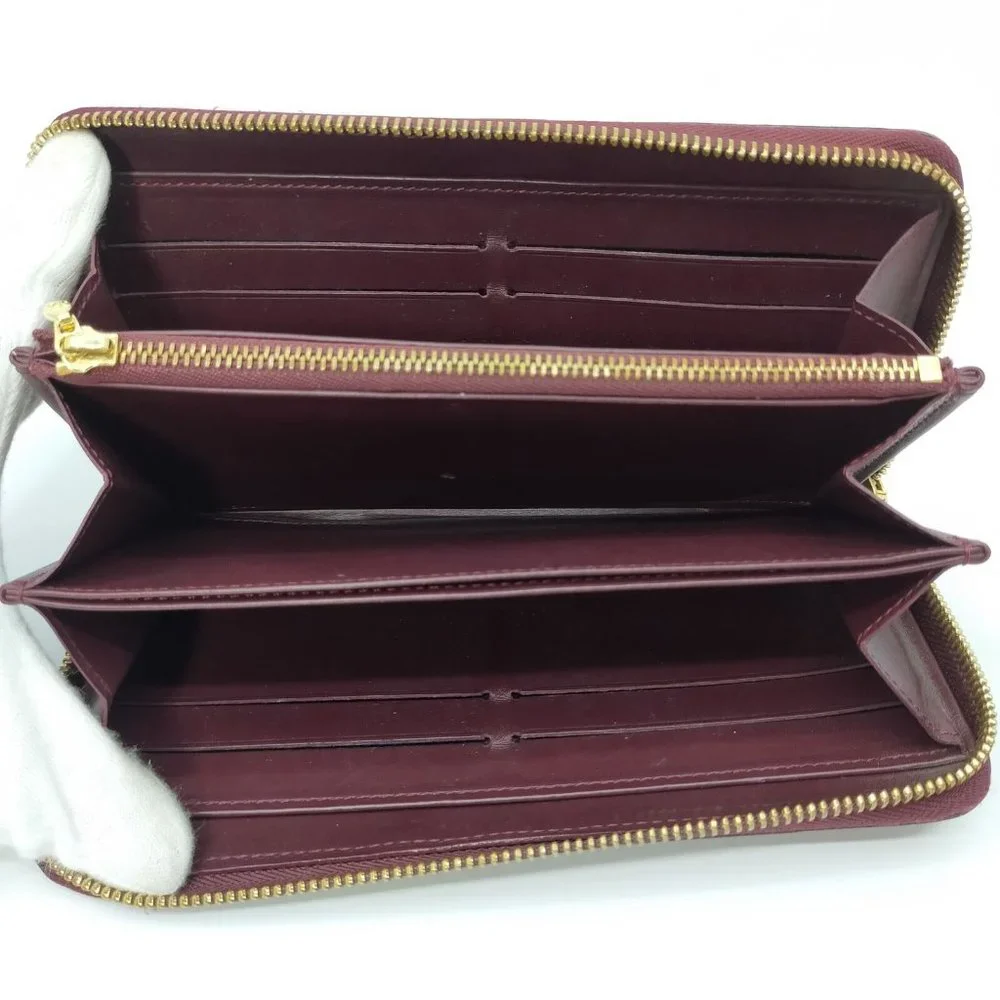 authentic  Louis Vuitton  Zippy Wallet Amarante vernis
